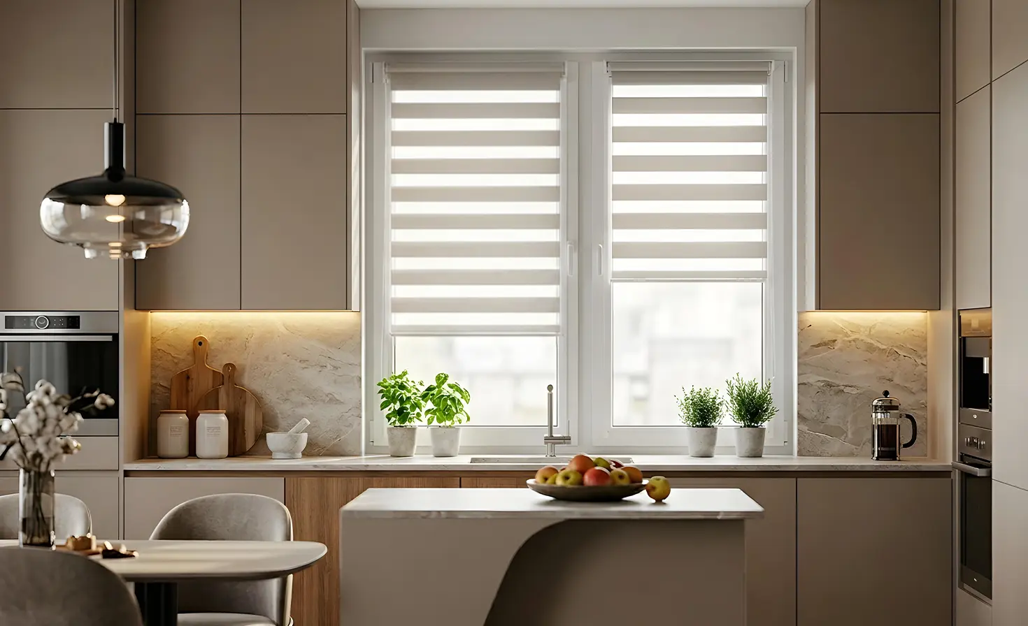 A modern kitchen with cream day and night roller blinds on the windows.